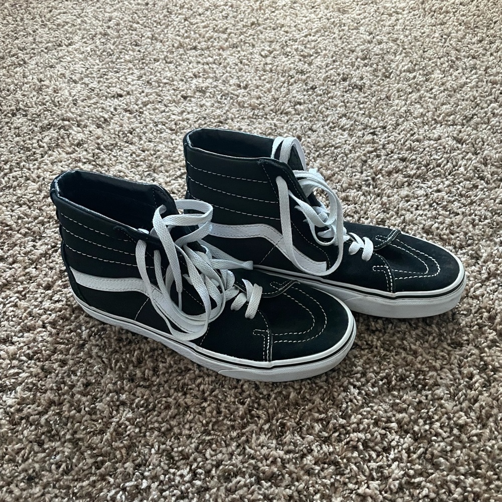 Black hightop vans, women’s size 8, men’s size 6.5